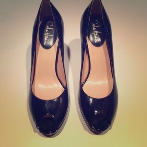 Cole Haan  Black patent “peep-toe” pumps
